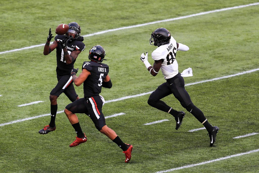Bearcats cornerback Ahmad Gardner makes an interception.
