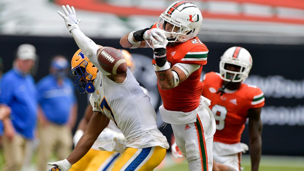 Top NFL Prospect Bubba Bolden defends a pas against a Pitt receiver while wearing the orange jerseys.
