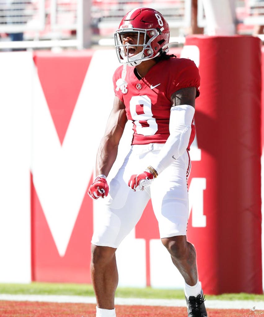 Alabama Crimson Tide wide receiver John Metchie III celebrates after a touchdown.