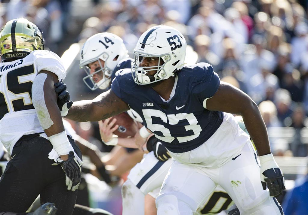Penn State offensive lineman Rasheed Walker blocks for his quarterback.